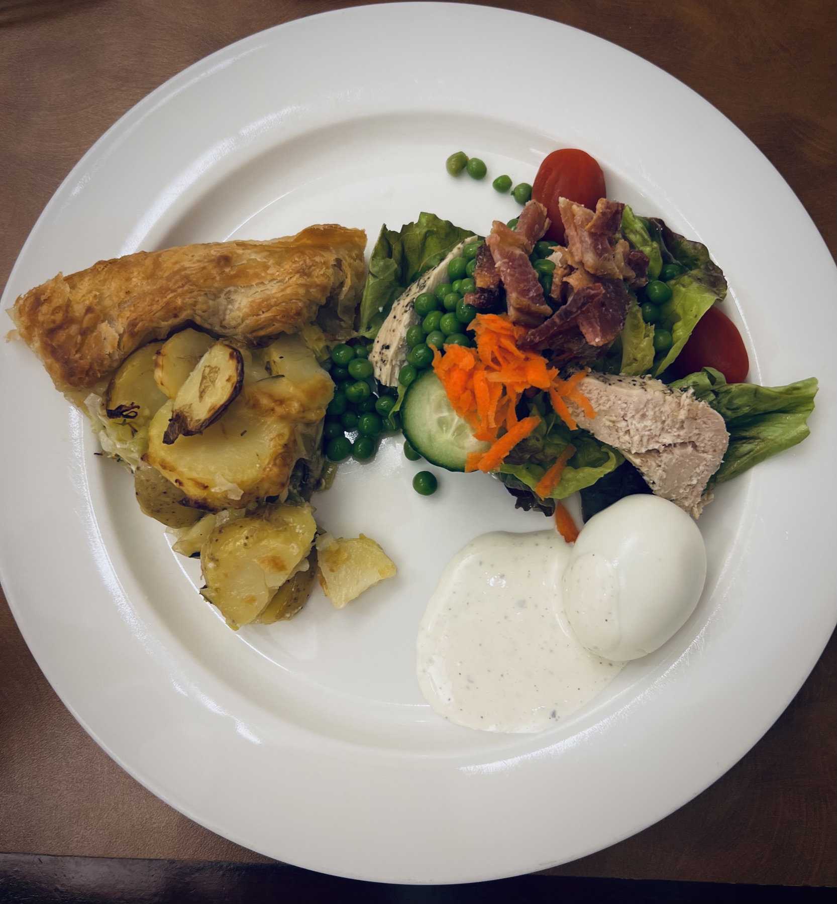 Potato and leek galette, golden and sliced